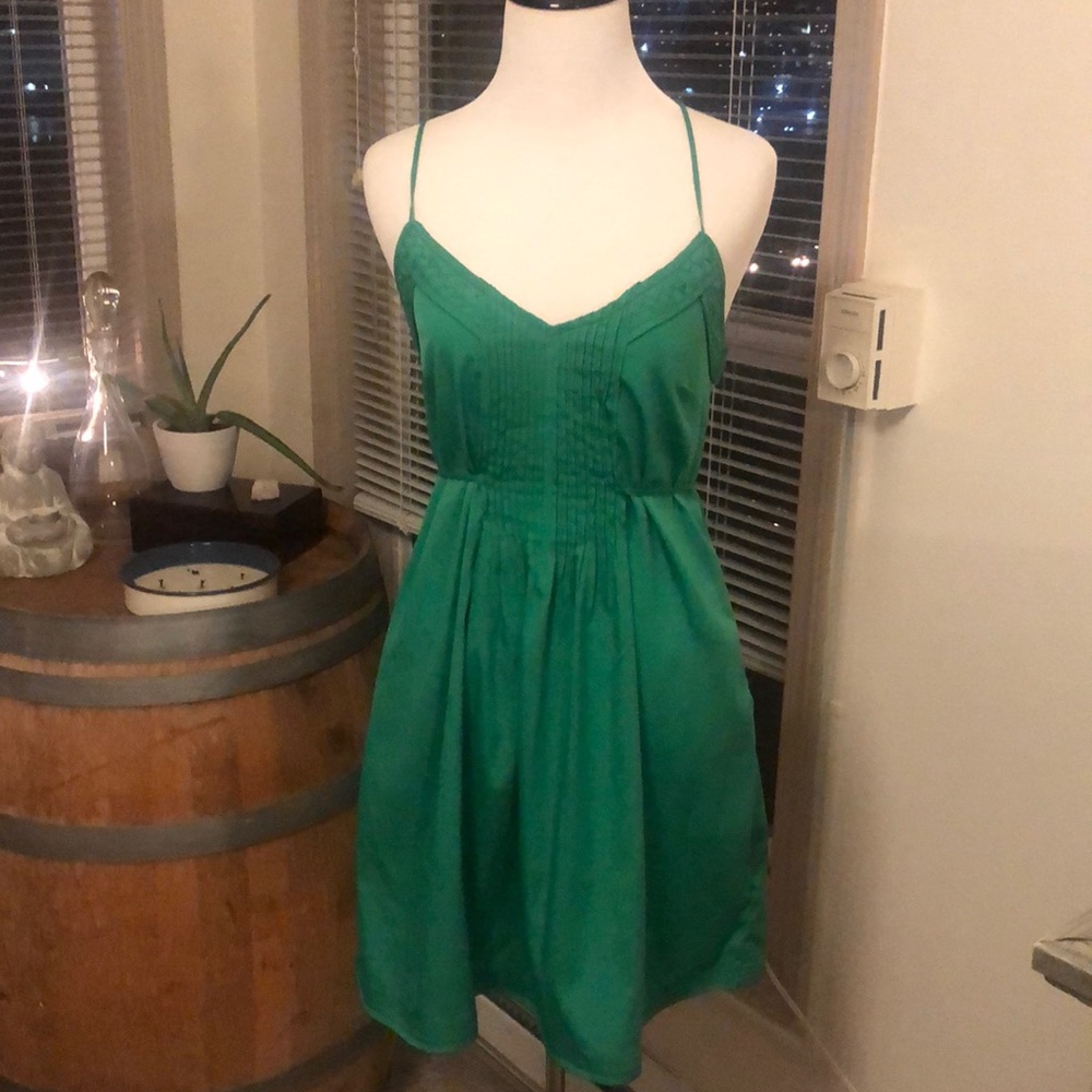 Ecote emerald green satin like material